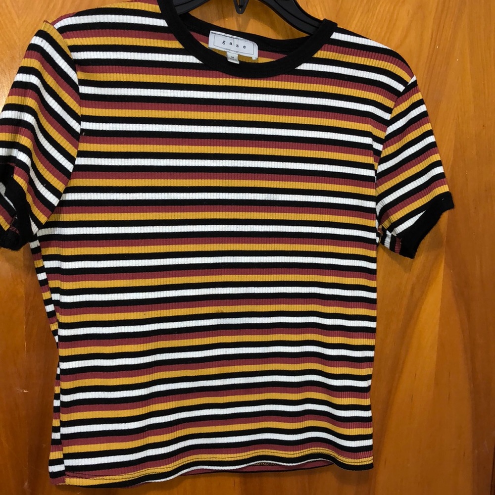 Women’s Stripped tee shirt. Size: Medium